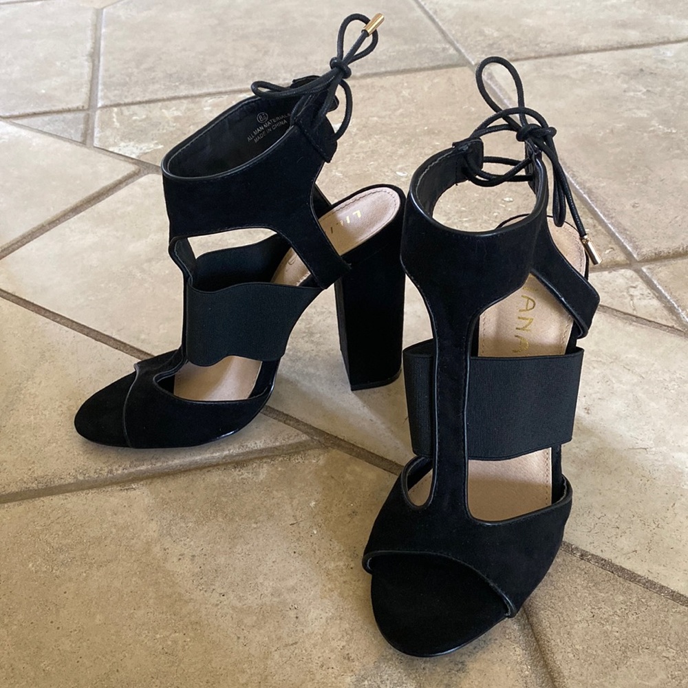 Black suede heels with tie in back